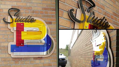 A multi-panel view of a sign that reads 'Studio' on a brick wall